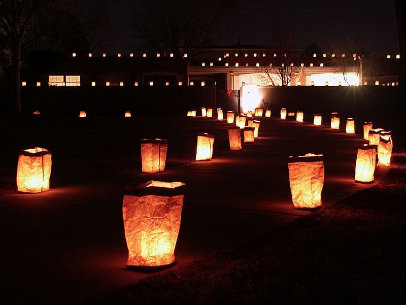 Artistic accents highlight the lighting design on a sidewalk