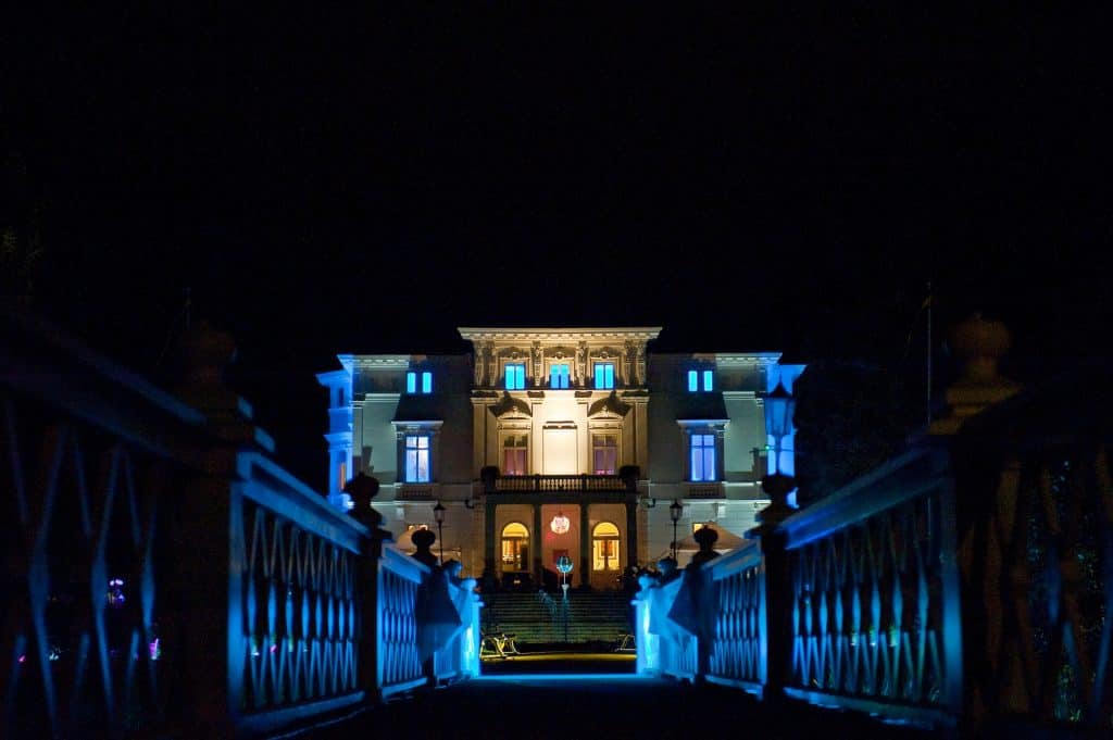 LED Lighting adds colorful blue accents to a palatial home's exterior