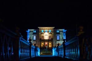 LED Lighting adds colorful blue accents to a palatial home's exterior