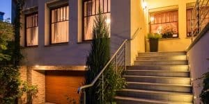 Lighting highlights the curb appeal of a modern home