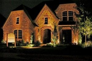a commerical office space lit up with outdoor lighting