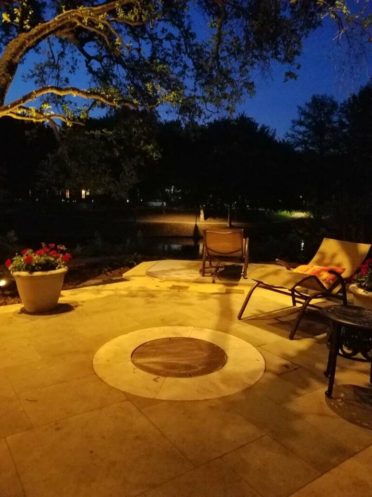 patio lit up with outdoor lighting
