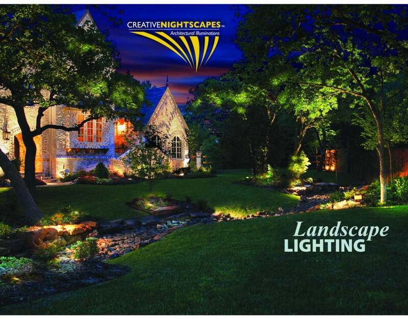 a beautiful backyard lit up with outdoor lighting