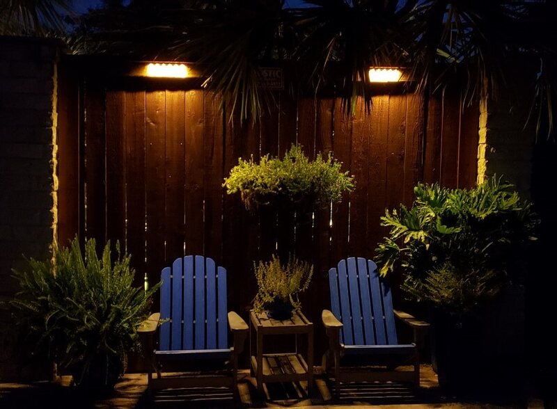 seating area lit up with outdoor lighting
